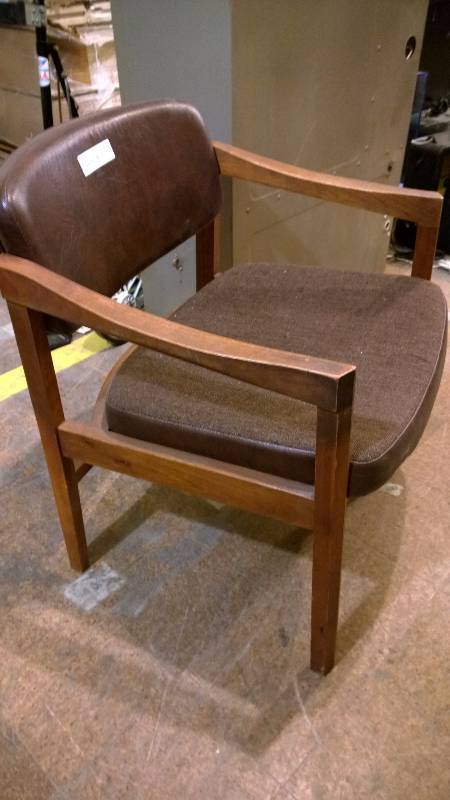 lot 9 image: Brown wood and leather chair