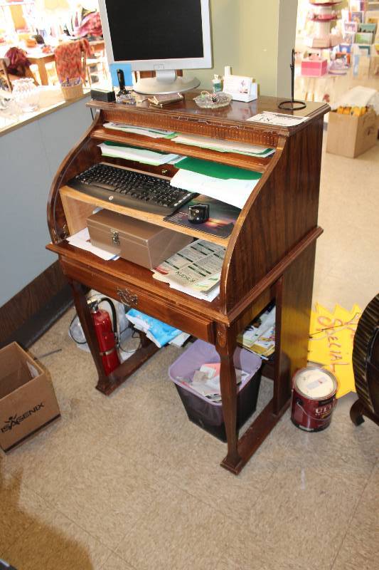 lot 18 image: Wooden Desk 30 x 22 x 46 Contents Included Except Computer.