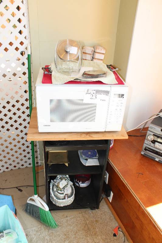 lot 23 image: Corner Lot Including Stand Microwave And More.
