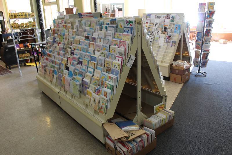 lot 36 image: Greeting Card Round-A-Bout Display Shelf Contents Included & All Racks Around 48 x 96 x 58.