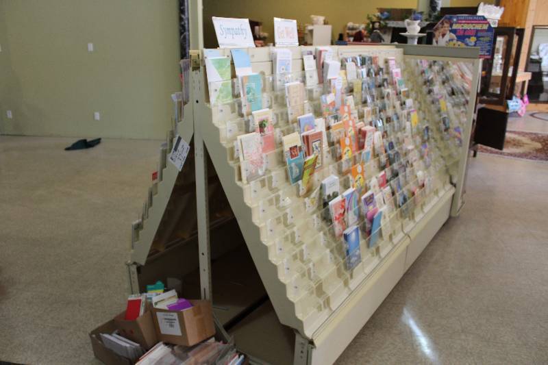 lot 37 image: Greeting Card Round-A-Bout Display Shelf Contents Included & All Racks Around 48 x 96 x 58.