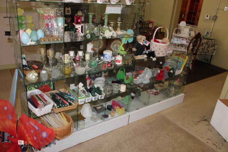 lot 48 image: Lot of (2) Display Shelves Collapsible Includes Contents Holiday Decorations, And More 48 x 16.