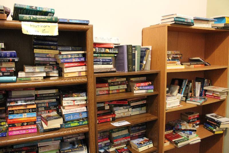 lot 41 image: Lot of (3) Wooden Shelves Includes Books.