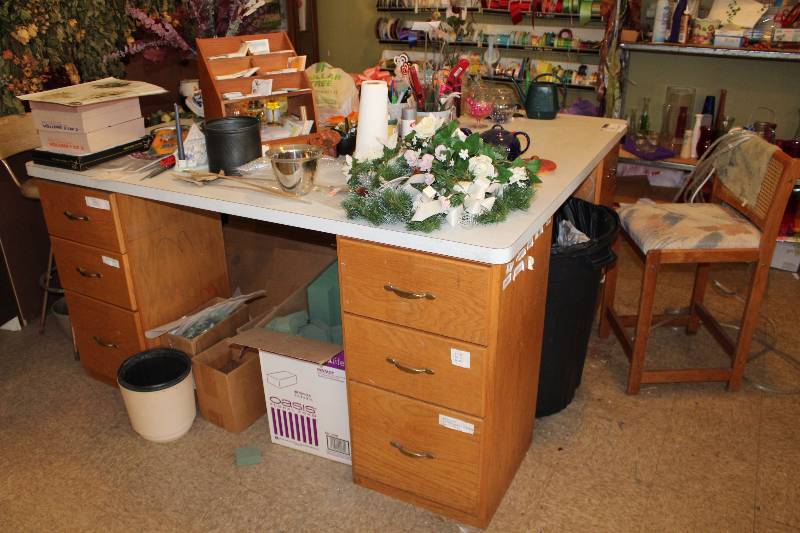 lot 56 image: Wooden Desk Includes Contents 61 x 72 x 36.