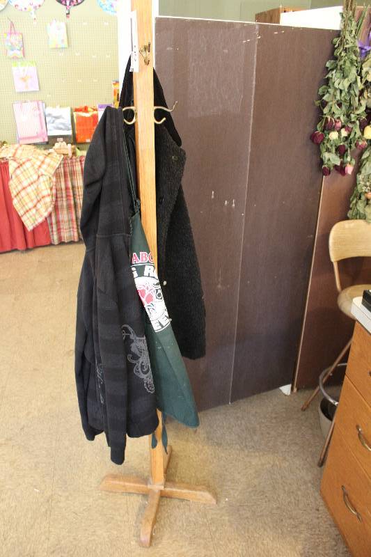 lot 60 image: Wooden Coat Rack Includes Contents.