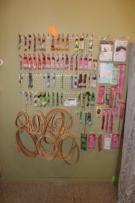 lot 62 image: Wall Lot Includes Contents Thread And More.