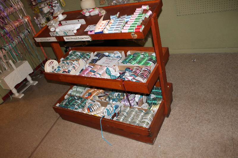 lot 67 image: Display Shelf Of Ribbons Includes Ribbon & Shelf.