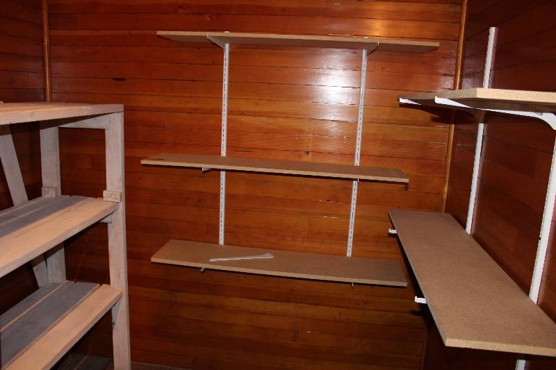 lot 110 image: Lot of Shelving Units Includes All Shelves In Room.