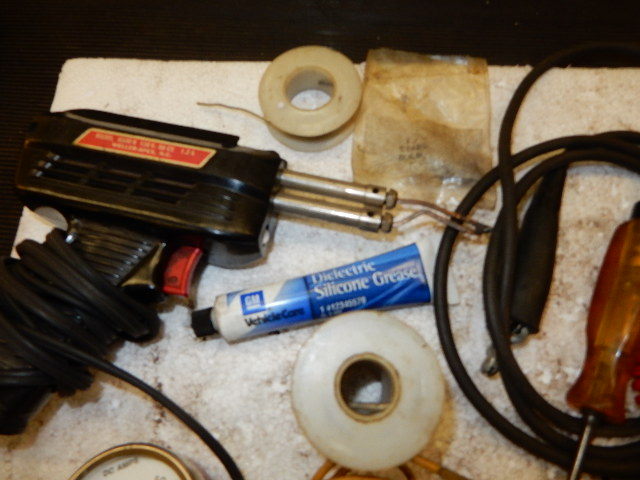 lot 73 image: 10 Amp Circuit breaker, Misc. Wires, Wire Terminal Removal Tools, Short finder, Test Lights, Soldering Gun, Alternator Current indicator,