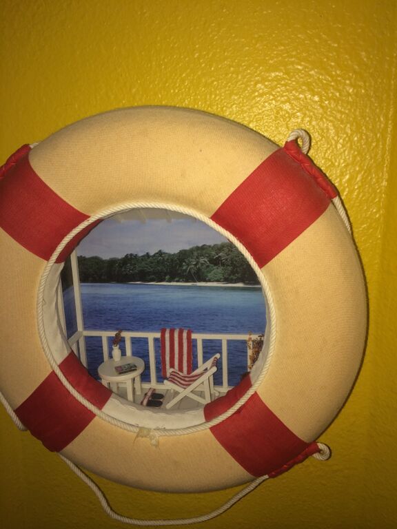 lot 103 image: Life Savers Wall Decor