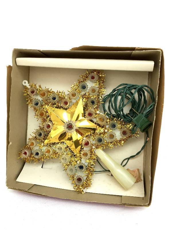 lot 13 image: One highly collectible 31 point star tree topper vintage in original box Tested works great