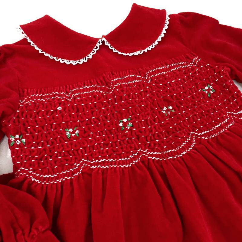 lot 21 image: Vintage highly resalable and collectible adorable and all things -ible Polly Flinders, hand smocked velvet red Christmas dress vintage girls size 6x.