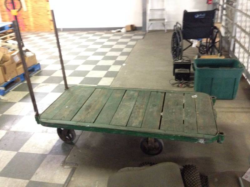 lot 45 image: Green Push Cart on Wheels 60 Inche...