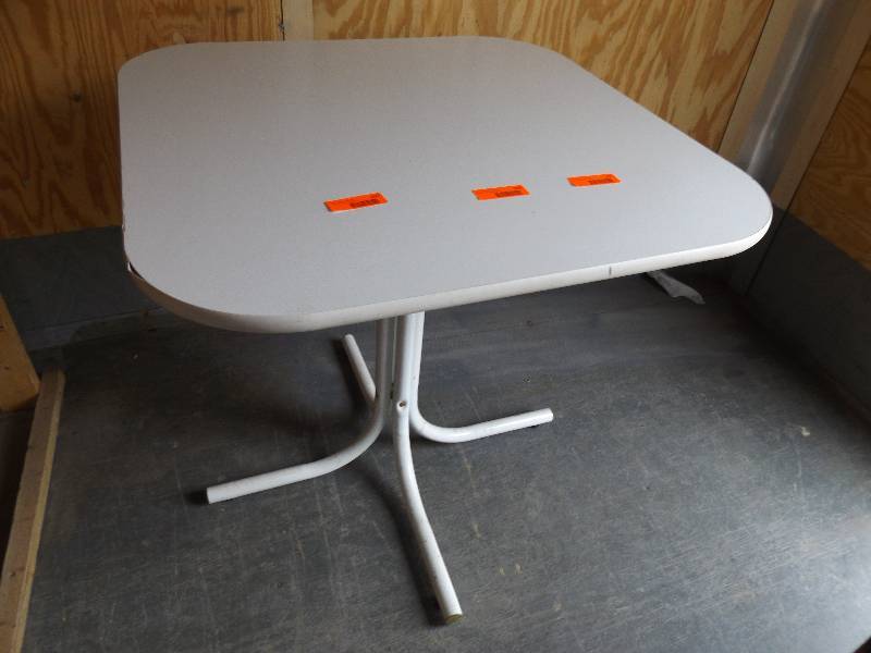 White Pedestal Table