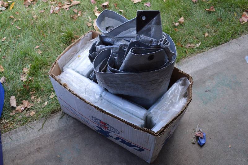 Tarps and box of Disposable Strechers (10)