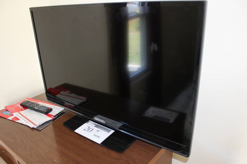 Sharp 32 Flat Screen TV with remote.