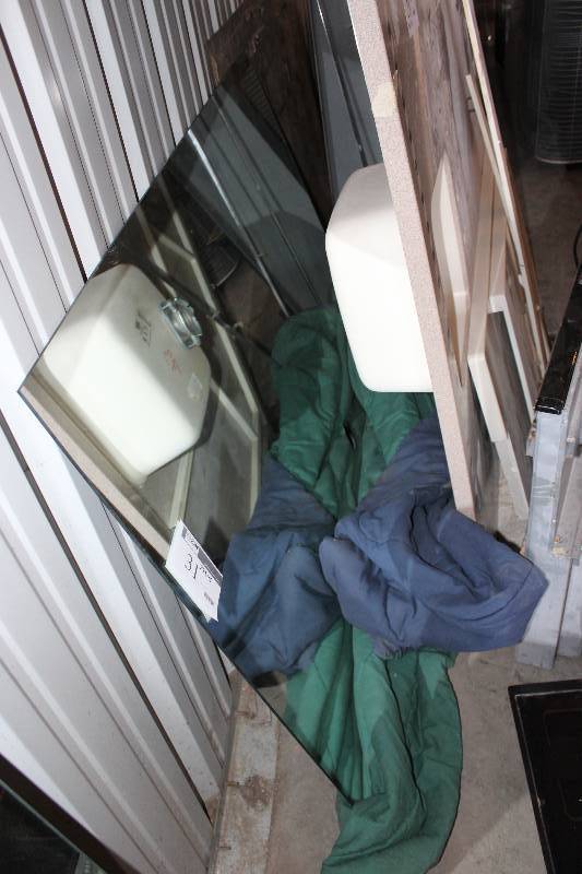 Mirror 74� x 45�.