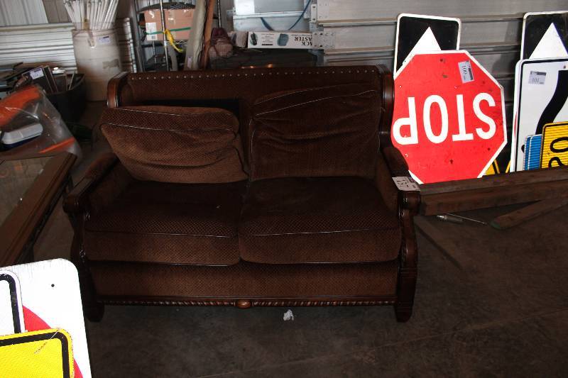 Couch wBrown Upholstery.