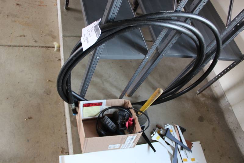 lot 24 image: Box Lot Including Plunger 34 Black Plastic Tube Water Pump.