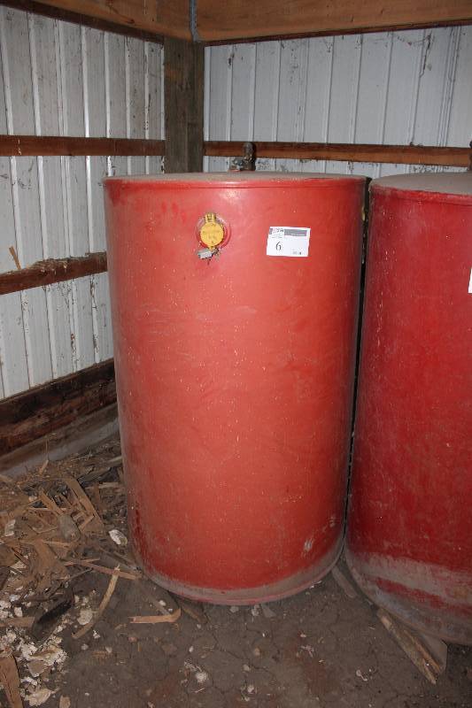 lot 6 image: 300 Gallon Tank wMetal Stand.