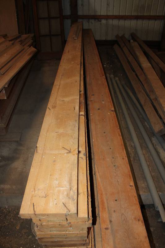 lot 104 image: Lot of (5) Used Pine 2 x 10s 16 Ft. Long.  Used Rafter Boards.