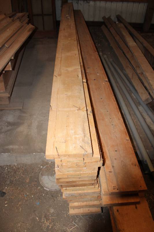 lot 106 image: Lot of (5) Used Pine 2 x 10s 16 Ft. Long.  Used Rafter Boards.