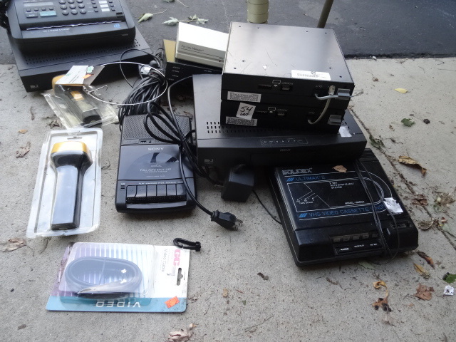 lot 54 image: Lot of Cable Boxes Telephone Equipment and Swivel Monitor Stand plus misc
