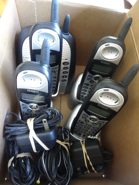 lot 62 image: Uniden 4 hand set cordless phone system