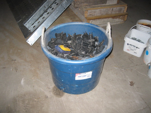 Tub of Concrete Holders and a chalk line