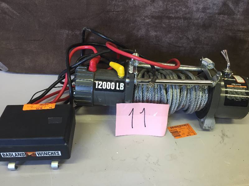 lot 11 image: Badland 12000 lb. Off-Road Vehicle Electric Winch with Automatic Load-Holding Brake
