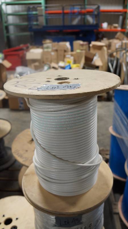 lot 45 image: NEW Partial of 1000 Spool of ColemanCable RG6 18 CCS 60AL CL2 75C WH Cable