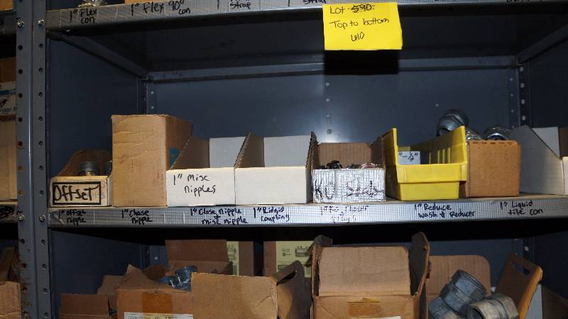 lot 610 image: Mixed Lot Of Straps, Locknut, Bushings, And Couplings.