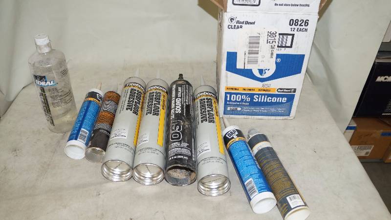 lot 615 image: Box Of Silicone And Subfloor Adhesive
