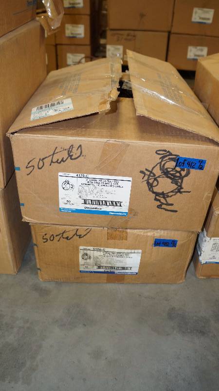 lot 412 image: NIB Thomas & Betts UnionBox 4 Diameter Outlet Box w Angled Nails - Approx 100 pcs