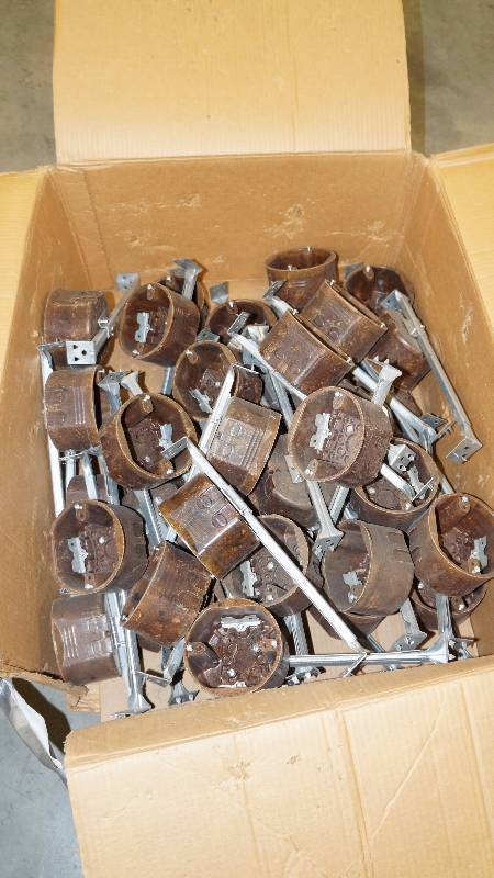 lot 401 image: Opened Partial Box of Challenger 4 Dir Box w 16 Bar Hanger Cable Clamps