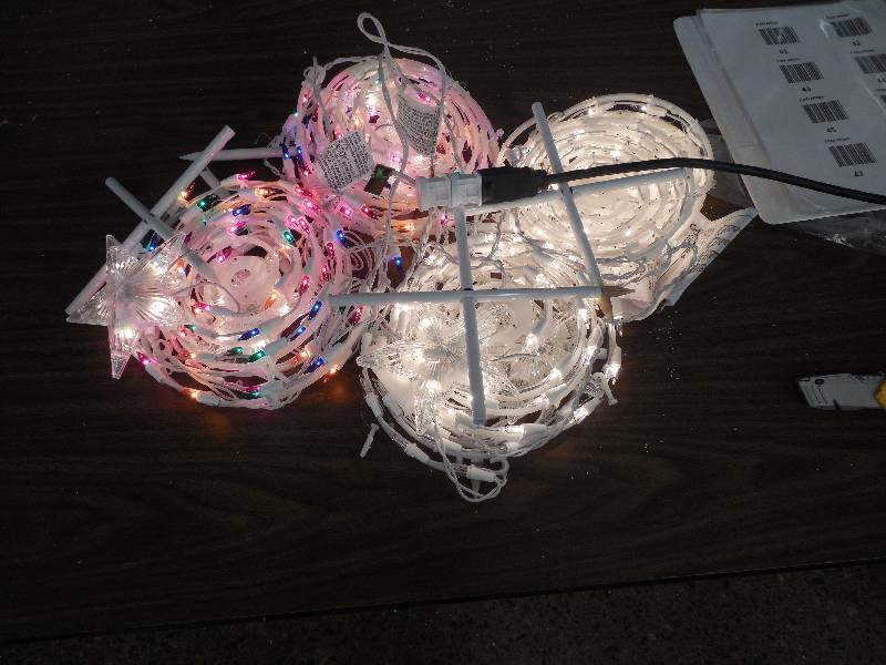 lot 56 image: (2) 18 in. Multi-Color Spiral Tree Pathway Lights (Set of 4)