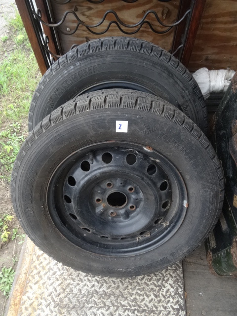 205 60R15 tires. 5 hole rims. at least half tread.