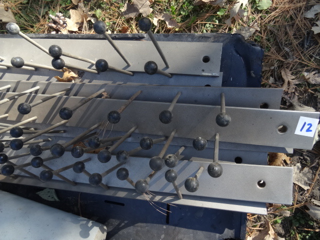 lot 12 image: 8 Metal Wall Hanging Hangers