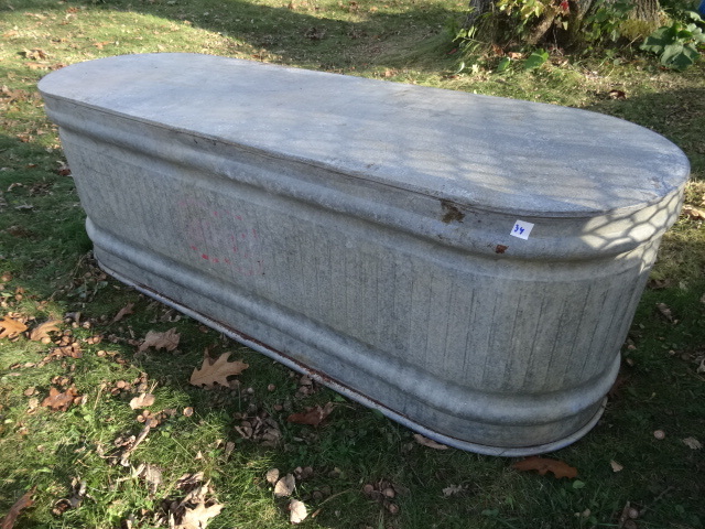 lot 34 image: Galvanized Stock Tank 70 X 23 X 26