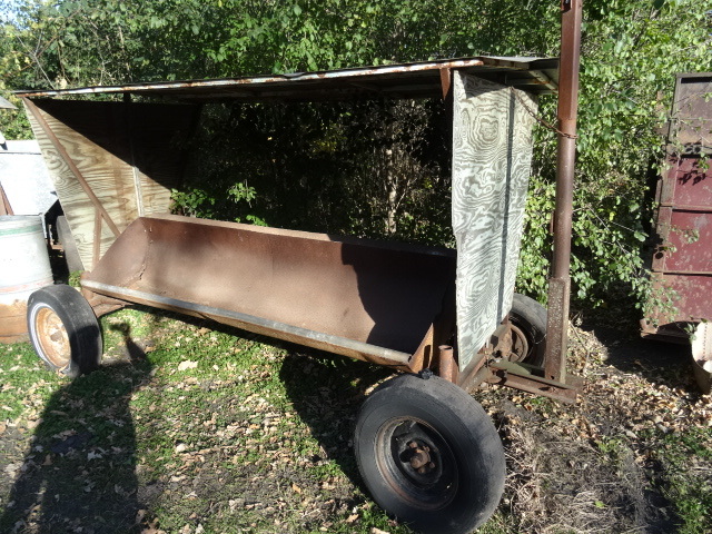 lot 106 image: Covered Feeder Wagon,