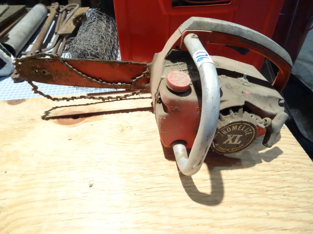 lot 176 image: Homelite XL Chain Saw 10 Bar