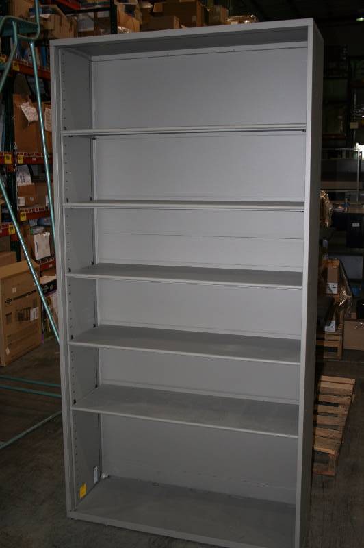 Tall gray shelving unit