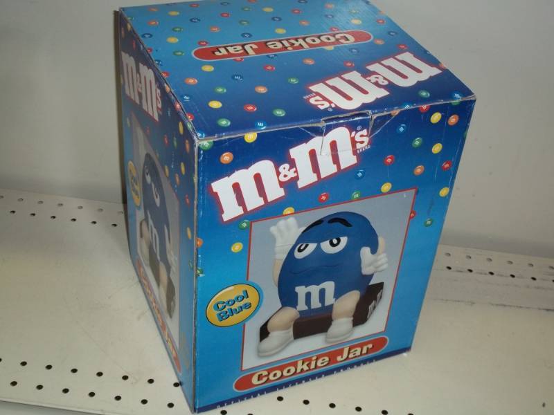 lot 27 image: Blue M & M Cookie Jar