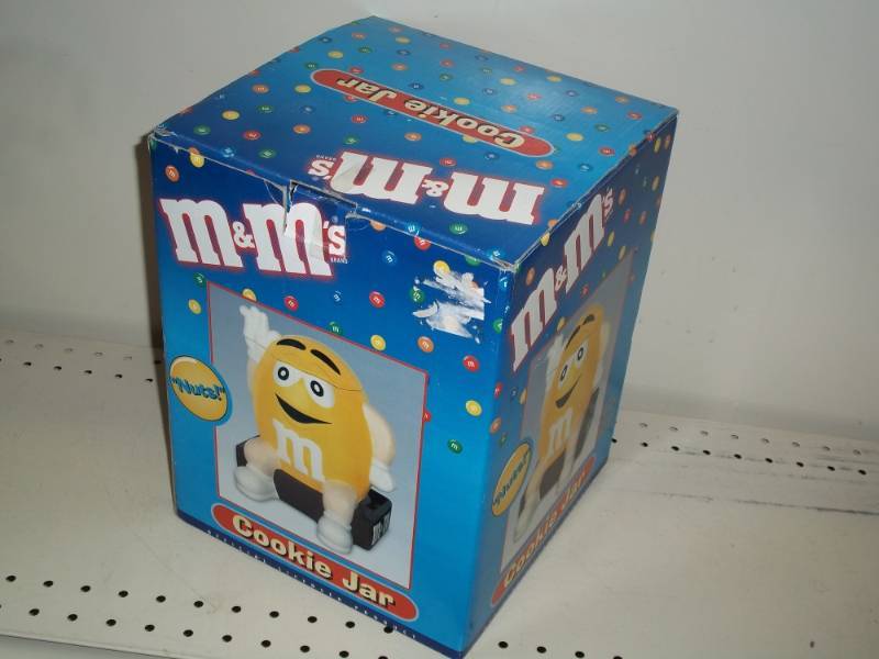 lot 28 image: Yellow M & M Cookie Jar