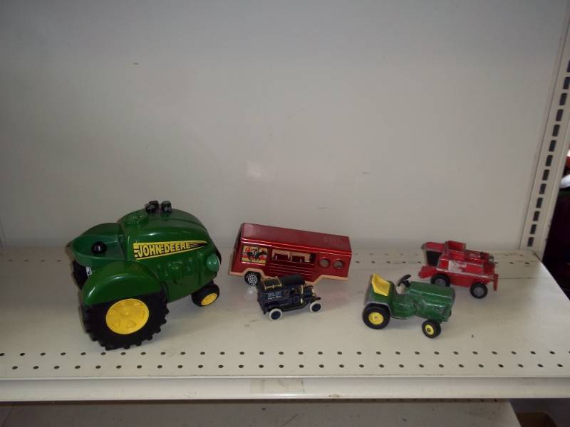 lot 83 image: Misc Lot of toys including John Deere Tractor, Trailer, combine, etc