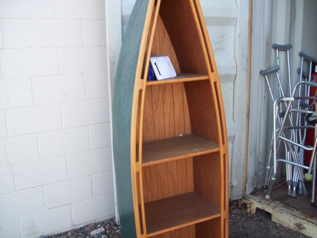 lot 1 image: Wooden Canoe Shelf