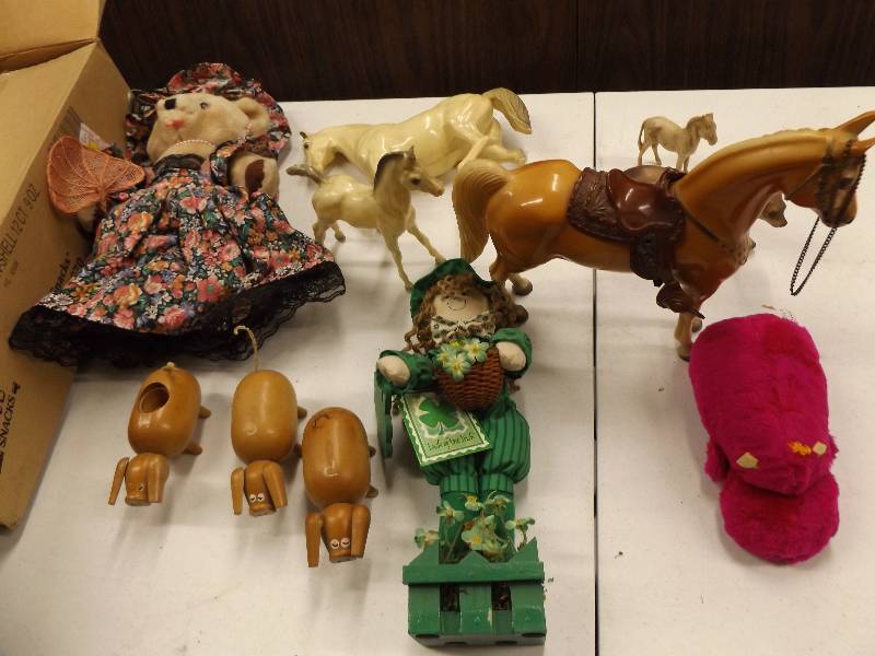 lot 108 image: Horses, Cougars, bears and doll
