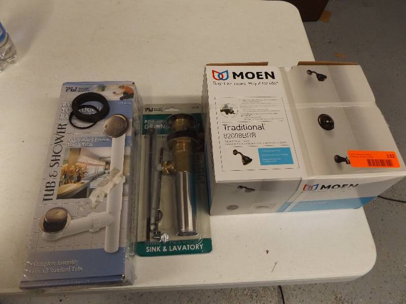 lot 132 image: Moen Shower Faucets and Drain Set