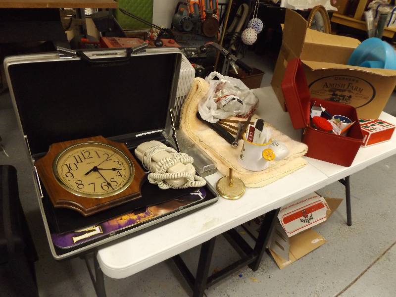 lot 146 image: Brief case Posters, Air Purifier, and Rug