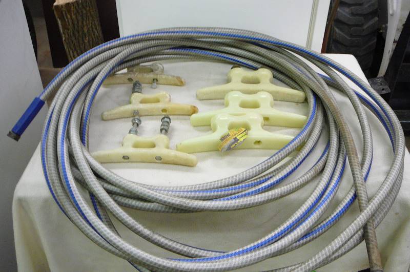 lot 85 image: Dock Cleats flow in Dark and water hose